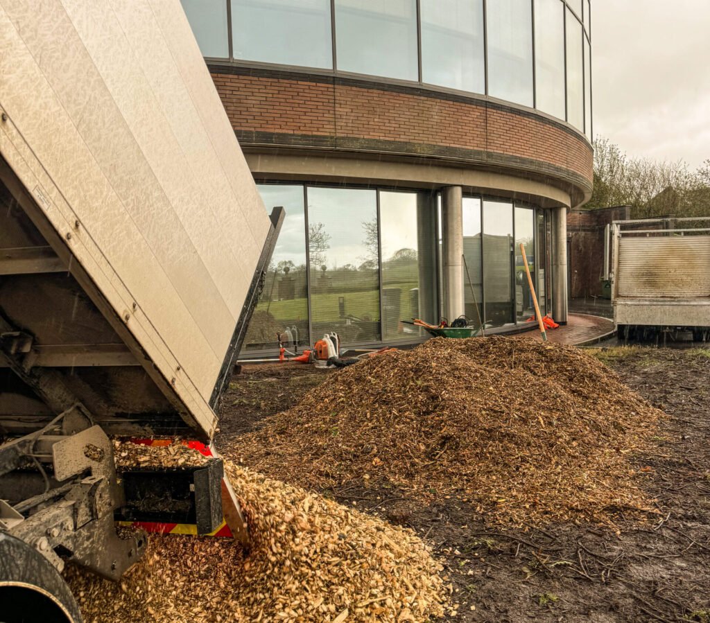 Woodchip mulch arriving on site.